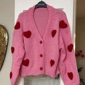 Cozy Pink Cardigan with Red Heart Details